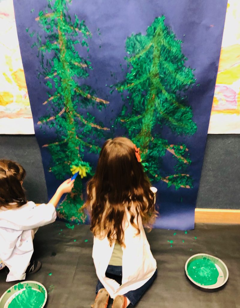 camping dramatic play ideas-painting a forest