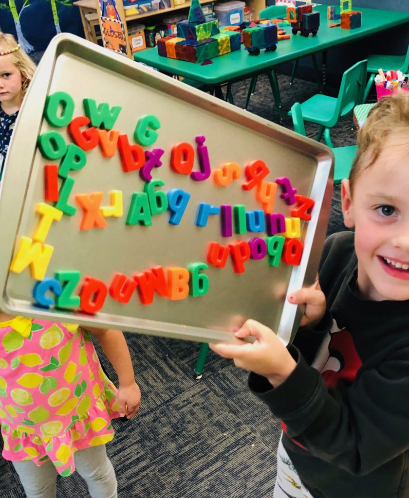 magnetic letters at the preschool literacy center