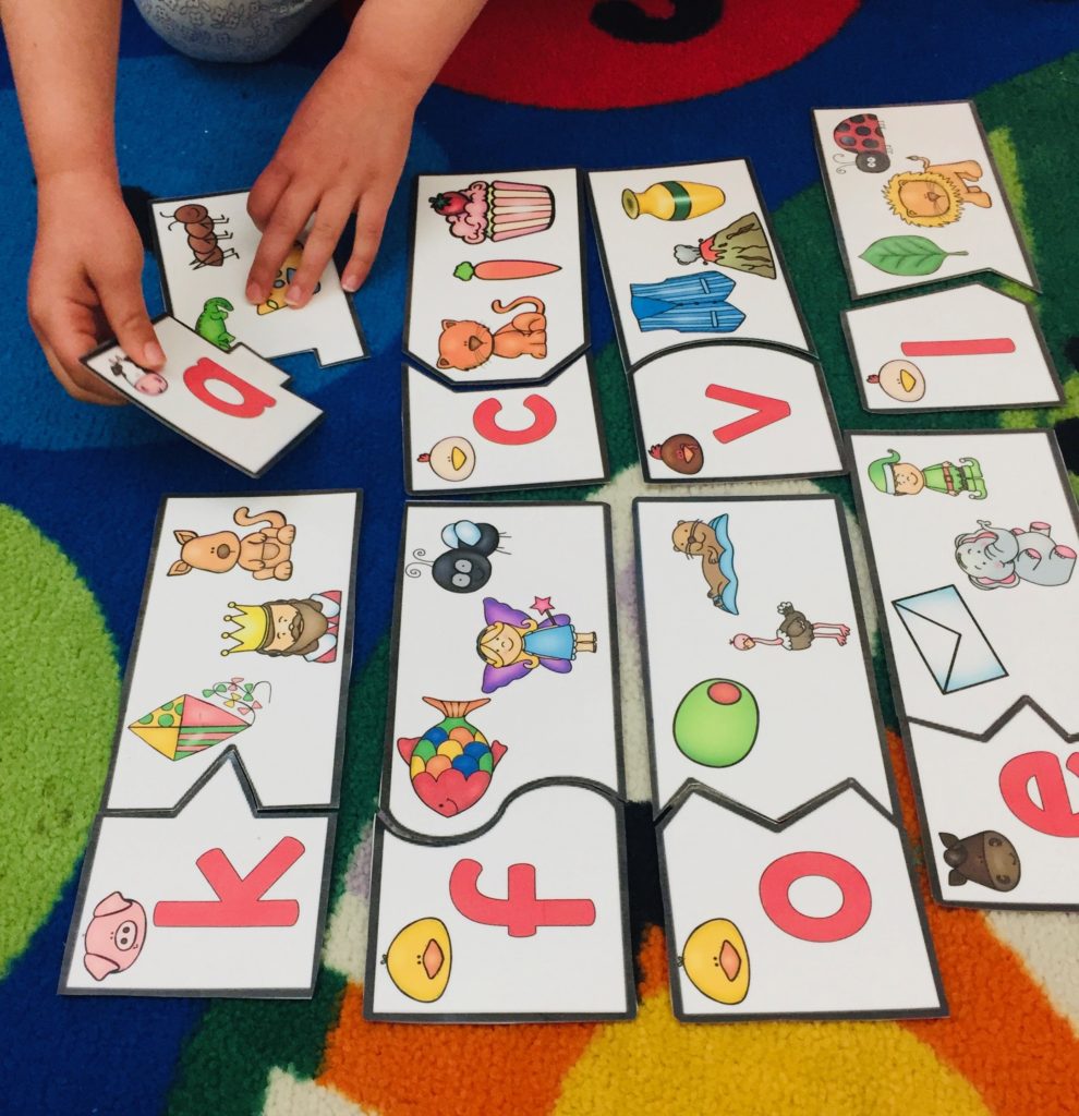 Preschool Literacy Activities Literacy center letter and sounds matching puzzles. preschool literacy